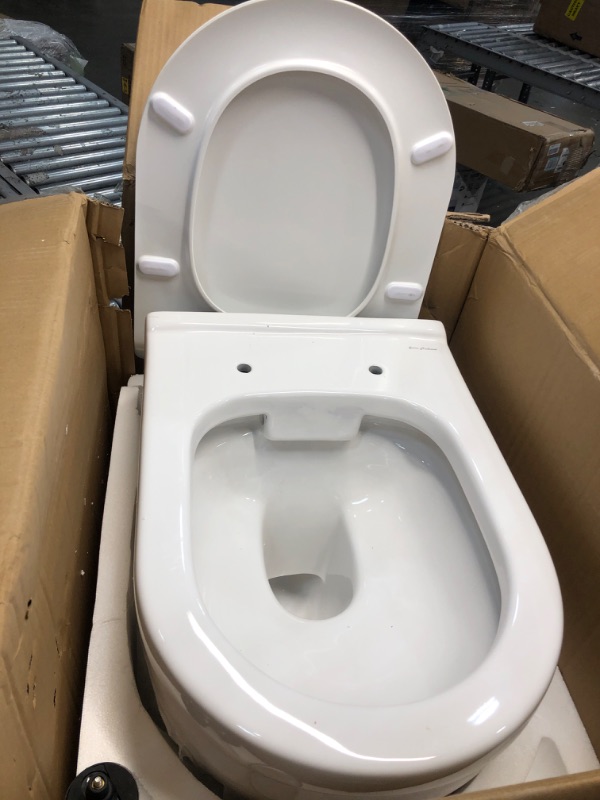 Photo 2 of (MISSING ACCESSORIES/HARDWARE) Swiss Madison Ivy Glossy White Dual Flush Elongated Standard Height Toilet Wall-hung Rough-In Size
