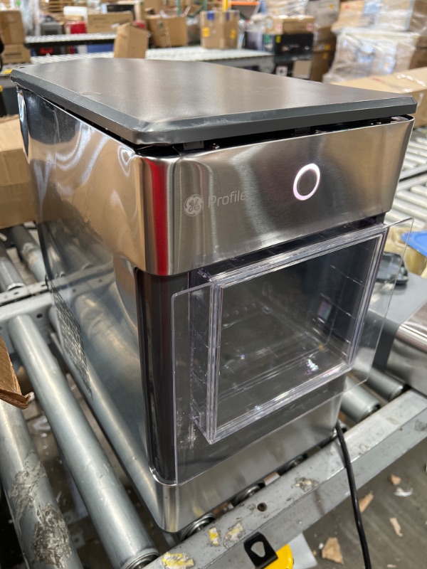 Photo 2 of GE Profile Opal | Countertop Nugget Ice Maker with Side Tank | Portable Ice Machine Makes up to 24 lbs. of Ice Per Day | Stainless Steel Finish**BROKEN PARTS HAS DENTS UNIT POWERS ON NEEDS REPAIRS**
