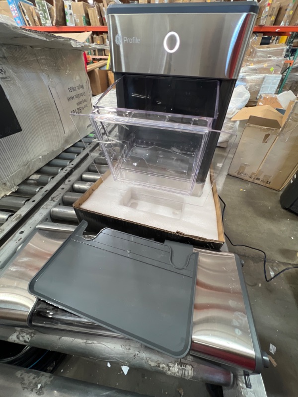 Photo 1 of GE Profile Opal | Countertop Nugget Ice Maker with Side Tank | Portable Ice Machine Makes up to 24 lbs. of Ice Per Day | Stainless Steel Finish
