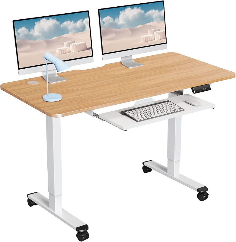 Photo 1 of WOKA Electric Standing Desk Adjustable Height, 48 x 24 Inches Stand up Desk with Keyboard Tray, Sit Stand Desk with Memory Controller for Home Office, Motorized Desk with Splice Board, Oak
