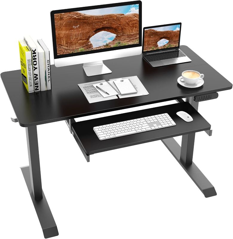 Photo 1 of SUBHTOH Adjustable Height Standing Desk  24 x 48 x 29.5 inches
