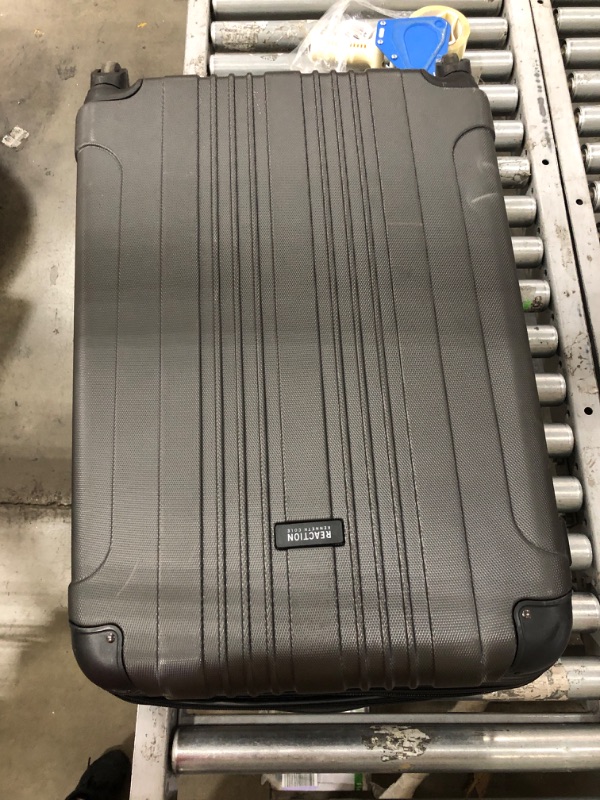 Photo 2 of USED: KENNETH COLE REACTION Out Of Bounds Luggage Collection Lightweight Durable Hardside 4-Wheel Spinner Travel Suitcase Bags, Charcoal, 28-Inch Checked
