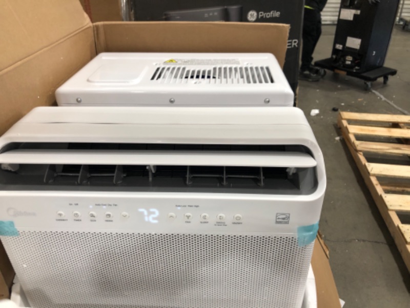 Photo 1 of Midea 8,000 BTU U-Shaped Smart Inverter Window Air Conditioner–Cools up to 350 Sq. Ft., Ultra Quiet with Open Window Flexibility, Works with Alexa/Google Assistant, 35% Energy Savings, Remote Control

