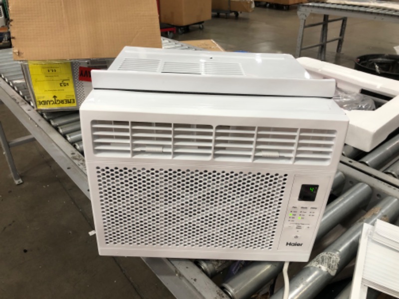 Photo 2 of *NONFUNCTIONAL* Haier Electronic Window Air Conditioner, 6,000 BTU, Easy Install Kit & Remote Included, Complete With Automatic Energy Saver Mode for Maximum Efficiency, Cools up to 250 Square Feet, 115 Volts