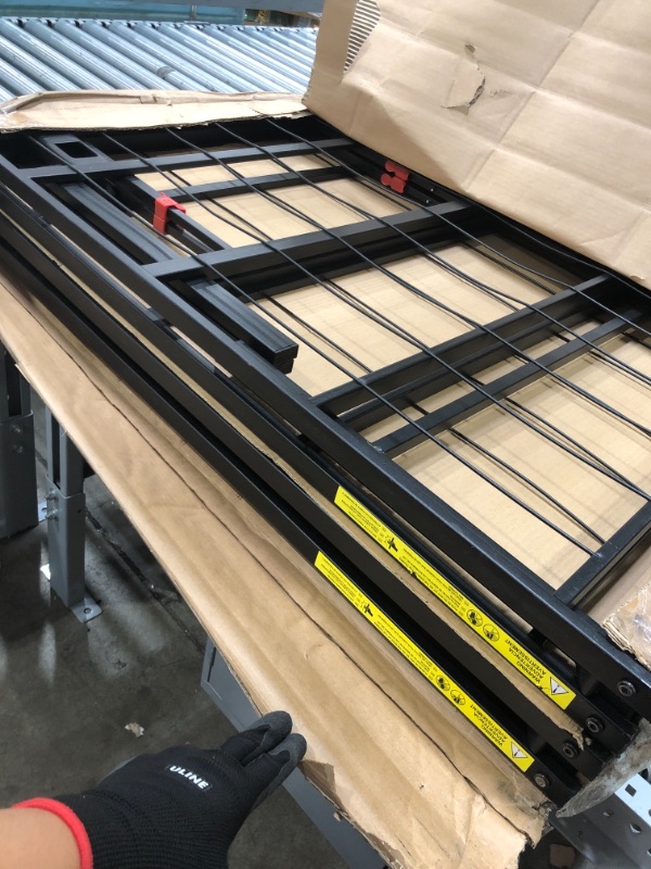 Photo 1 of Amazon Basics Foldable Metal Platform Bed Frame with Tool Free Setup, 18 Inches High, Queen, Black
