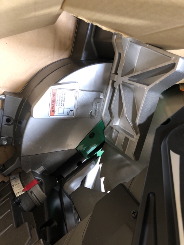 Photo 6 of **PARTS ONLY NON-FUNCTIONAL**
Metabo HPT 12-Inch Compound Miter Saw, Laser Marker System, Double Bevel, 15-Amp Motor, Tall Pivoting Aluminum Fence, 5 Year Warranty (C12FDHS)
