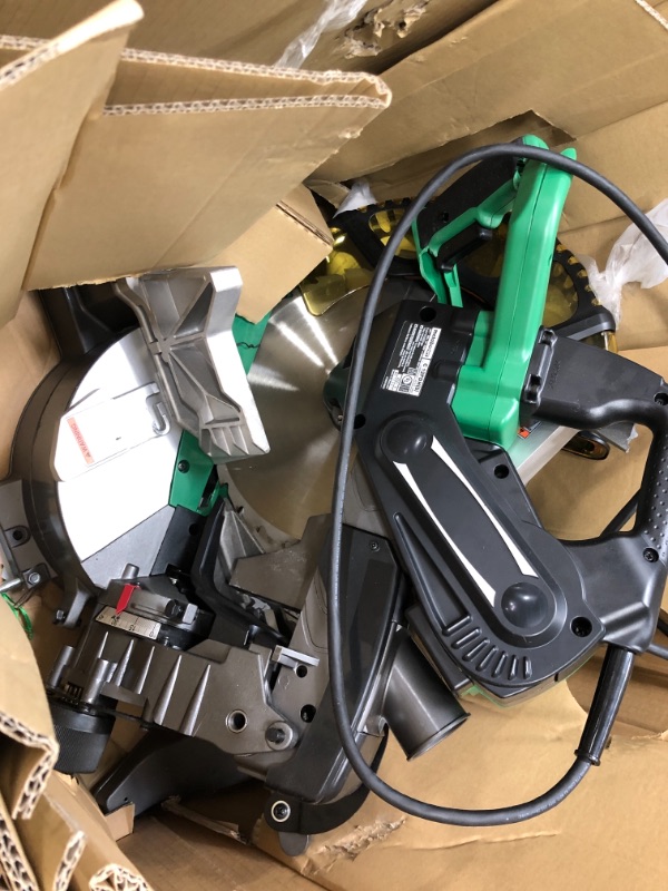 Photo 7 of **PARTS ONLY NON-FUNCTIONAL**
Metabo HPT 12-Inch Compound Miter Saw, Laser Marker System, Double Bevel, 15-Amp Motor, Tall Pivoting Aluminum Fence, 5 Year Warranty (C12FDHS)
