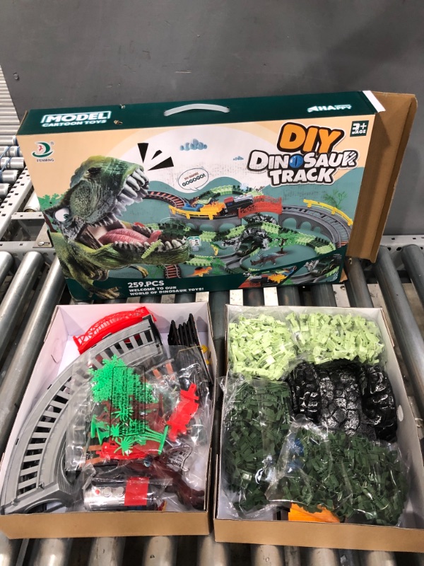 Photo 3 of 2022 Dinosaur Toys and Electric Train Sets, 259 Pcs Dinosaur World Road Race Toy with 8 Dino, 1 Train, 1 Race Car, Lights& Sound, Cargo Cars& Tracks, Gift for Kids Ages 3 4 5 6 7+ Year Old Boys Girls