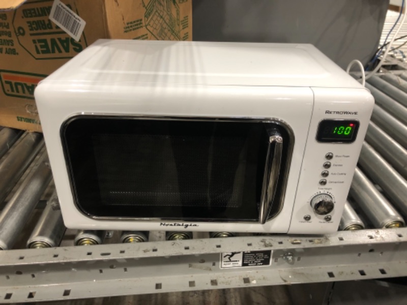 Photo 2 of Nostalgia CLMO7WH Classic Retro 0.7 Cu. Ft. 700-Watt Countertop Microwave Oven With LED Display, 5 Power Levels, 8 Cook Settings, White
