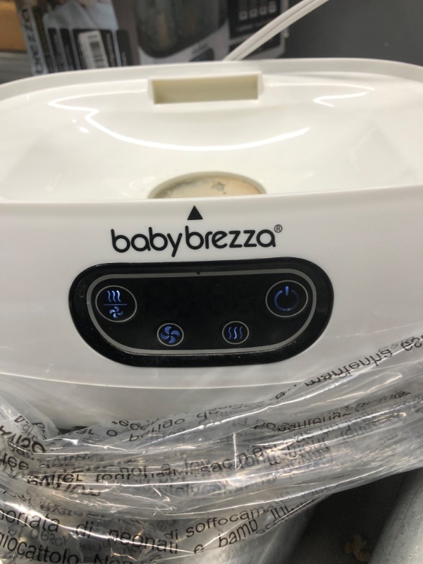 Photo 3 of Baby Brezza Baby Bottle Sterilizer and Dryer Advanced – Electric Steam Sterilization Machine – Universal Sterilizing for All Bottles: Plastic + Glass + Pacifiers + Breast Pump Parts - HEPA Filtration
