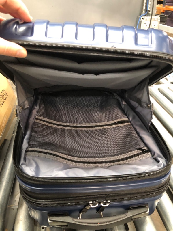 Photo 4 of DELSEY Paris Titanium Hardside Expandable Luggage with Spinner Wheels, Midnight Blue, Carry-On 19 Inch
