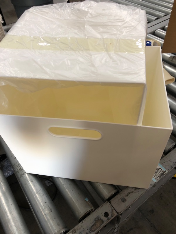 Photo 1 of 2 White bins 