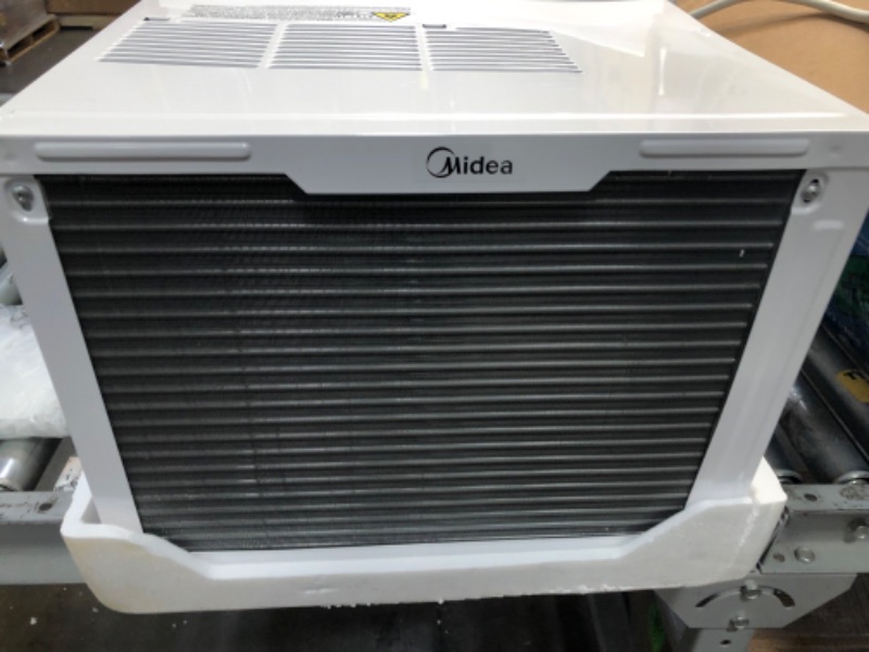 Photo 1 of MIDEA MAW12R1BWT 12,000 BTU EasyCool Window Air Conditioner, Fan-Cools, Circulates, and Dehumidifies Up to 550 Square Feet, Has A Reusable Filter, and Includes an LCD Remote Control
