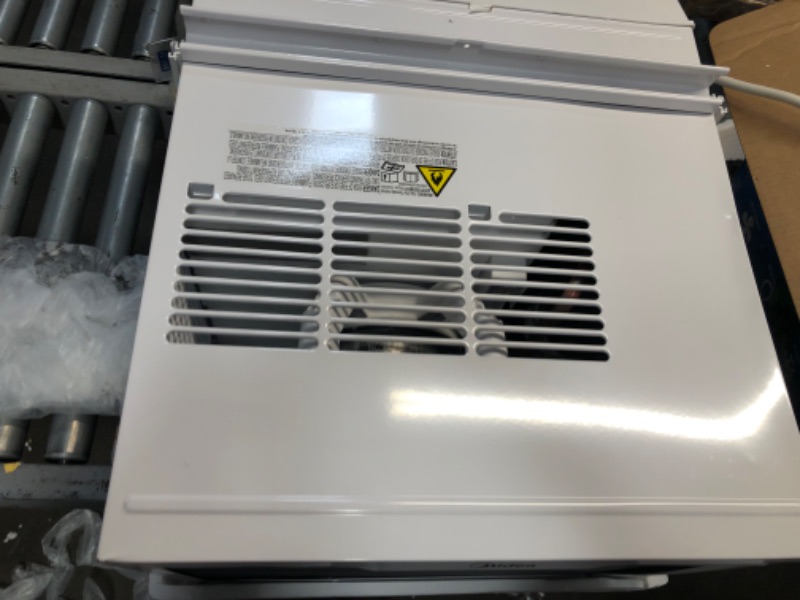 Photo 1 of MIDEA MAW12R1BWT 12,000 BTU EasyCool Window Air Conditioner, Fan-Cools, Circulates, and Dehumidifies Up to 550 Square Feet, Has A Reusable Filter, and Includes an LCD Remote Control
