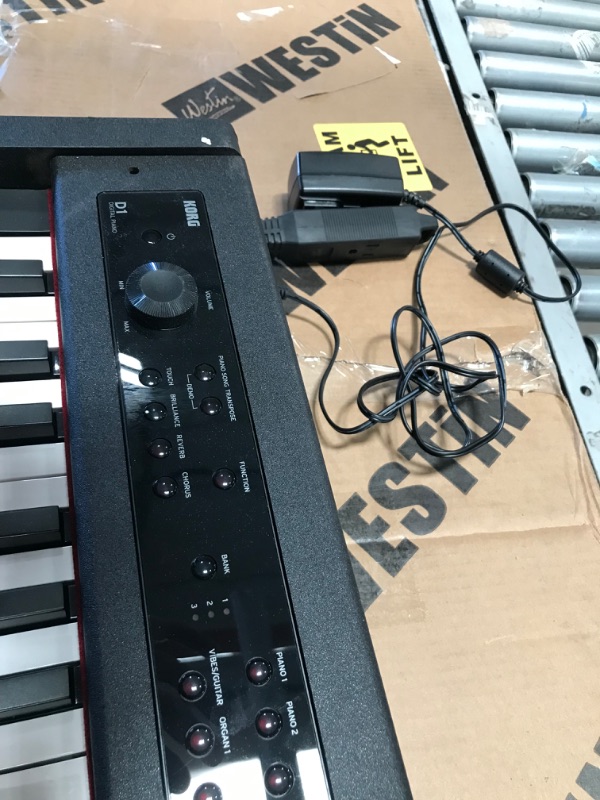 Photo 5 of (DAMAGED, DOES NOT FUNCTION)Korg D1 88-Key Stage Piano Controller
**DAMAGED KEYS, ENDS OF KEYBOARD ARE LOOSE, DID NOT POWER ON**