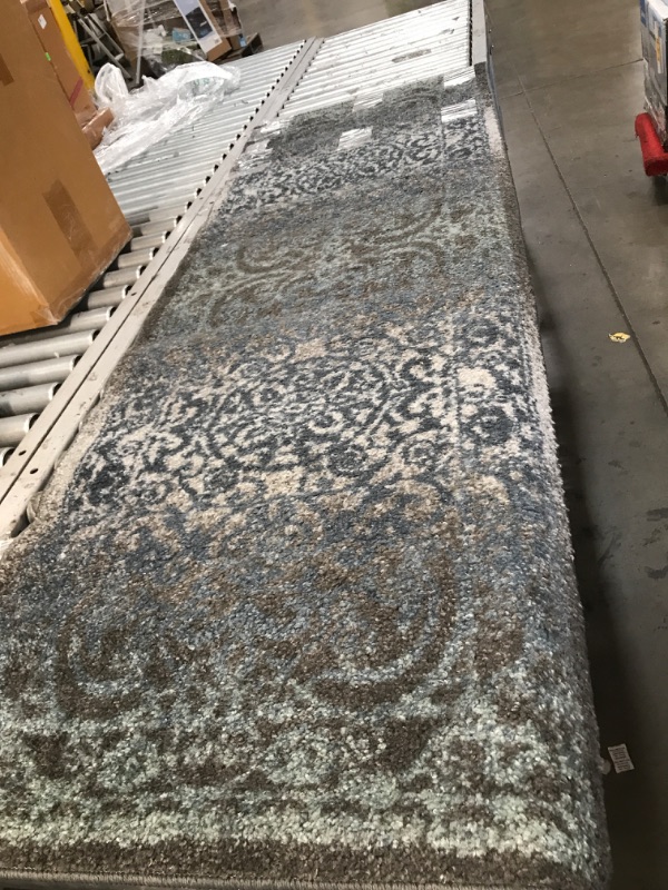 Photo 1 of 2' x 6' grey and blue rug 