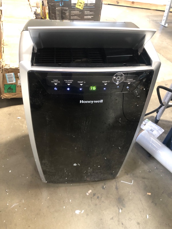 Photo 4 of (DAMAGED SIDE) Honeywell Portable Air Conditioner w Heat Pump, Dehumidifier & Fan, Cools & Heats Rooms Up to 700 Sq. Ft. w Remote & Advanced LED Display, MN4HFS9
