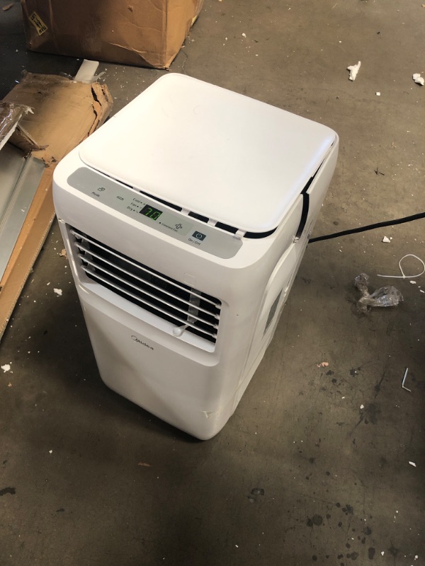 Photo 2 of (MULT. DAMAGES TO FRAME )Midea 8,000 BTU ASHRAE (5,300 BTU SACC) Portable Air Conditioner, Cools up to 175 Sq. Ft., Works as Dehumidifier & Fan, Remote Control & Window Kit Included
