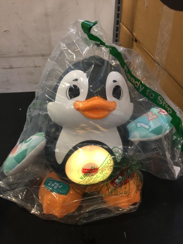 Photo 2 of Fisher-Price Linkimals Cool Beats Penguin, Musical Infant Toy with Lights, Motions, and Educational Songs for Infants and Toddlers