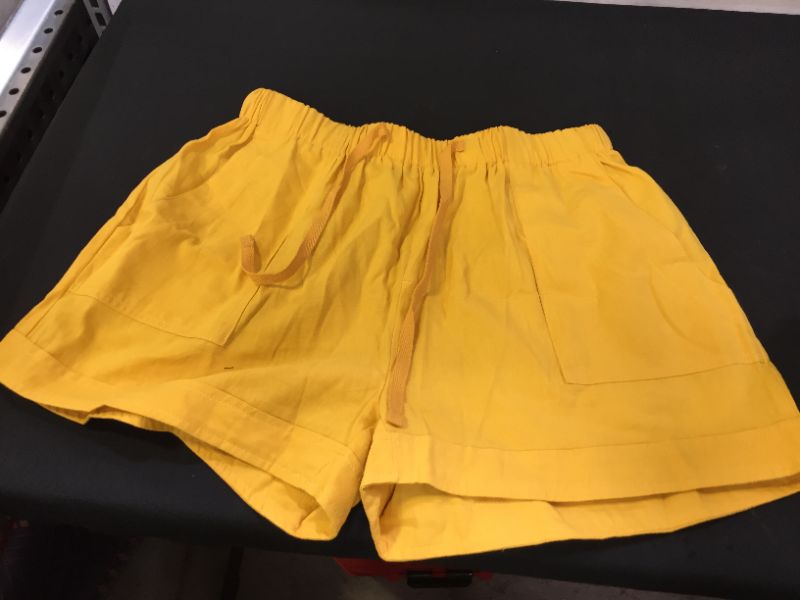 Photo 1 of LARGE YELLOW SHORTS