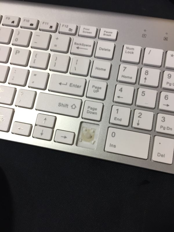 Photo 2 of wireless keyboard (damaged to a keycap)