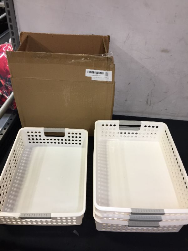 Photo 1 of  4 pack white bins APROX 10in X 13.5in 
