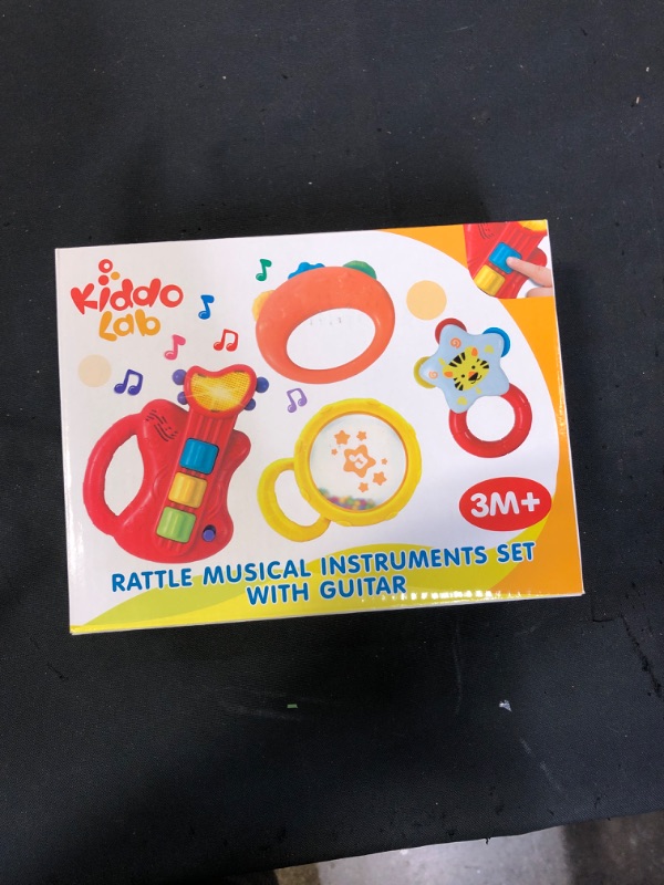 Photo 2 of KiddoLab Baby Rocker Musical Kids Guitar Instruments Set with Electric Toy Guitar and Rattles. Baby Guitar Toys for Early Development and Music Educational Learning. 3 Months and Older
