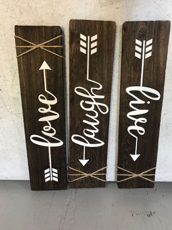 Photo 2 of Dahey 3 Pieces Rustic Wood Sign Arrow Wall Decor Live Laugh Love Quote Sign Farmhouse Wall Mount Decoration for Home, Living Room, Mothers Day, Wedding, Housewarming Gift 13"x 3", Brown