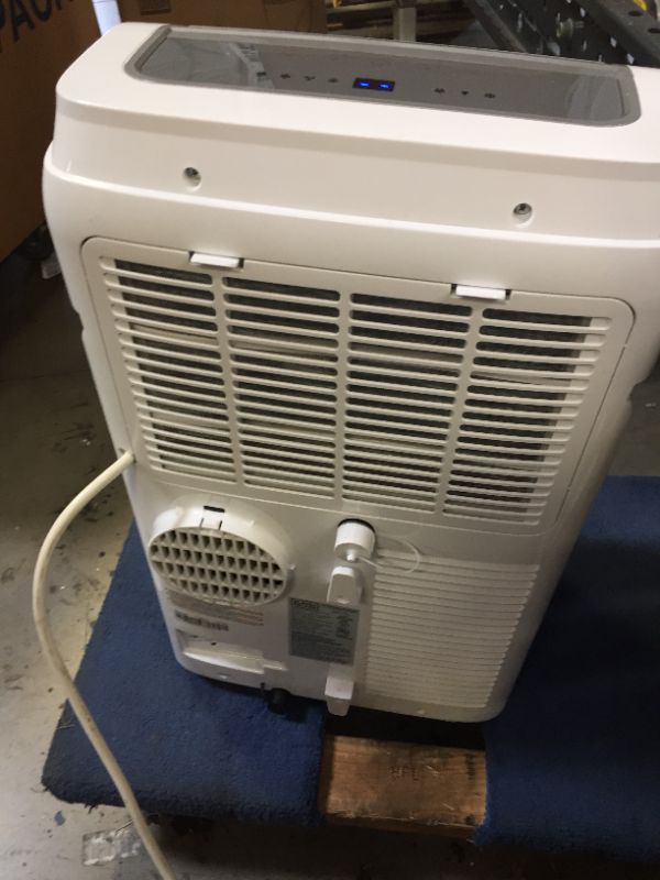 Photo 1 of BLACK+DECKER 10,000 BTU Portable Air Conditioner with Remote Control, White---ITEM IS SCUFFED AND HAS SCRATCHES FROM EXPOSURE AND IS DIRTY---MISSING ACCESSOIRES AND BOX---