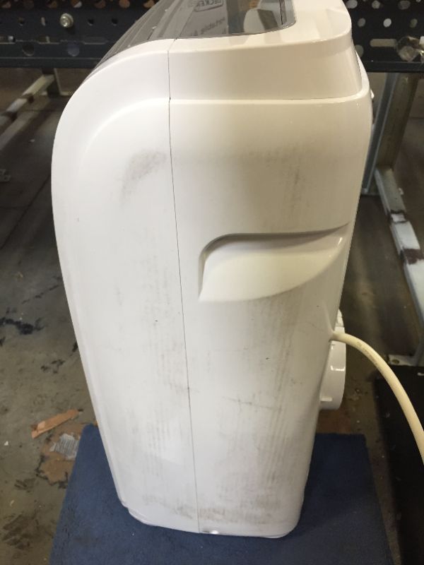Photo 1 of BLACK+DECKER 10,000 BTU Portable Air Conditioner with Remote Control, White---ITEM IS SCUFFED AND HAS SCRATCHES FROM EXPOSURE AND IS DIRTY---MISSING ACCESSOIRES AND BOX---