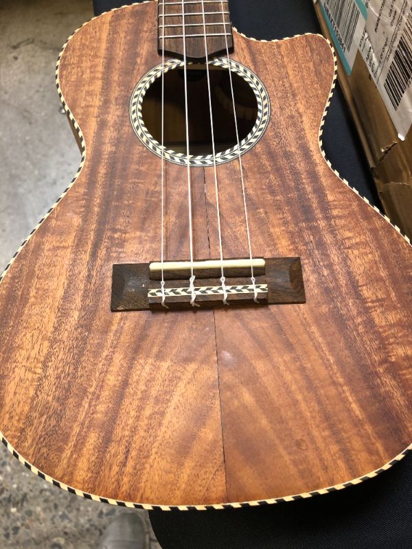 Photo 9 of Cordoba, 4-String Ukulele, Right, Tenor Cutaway Electric (04043)
