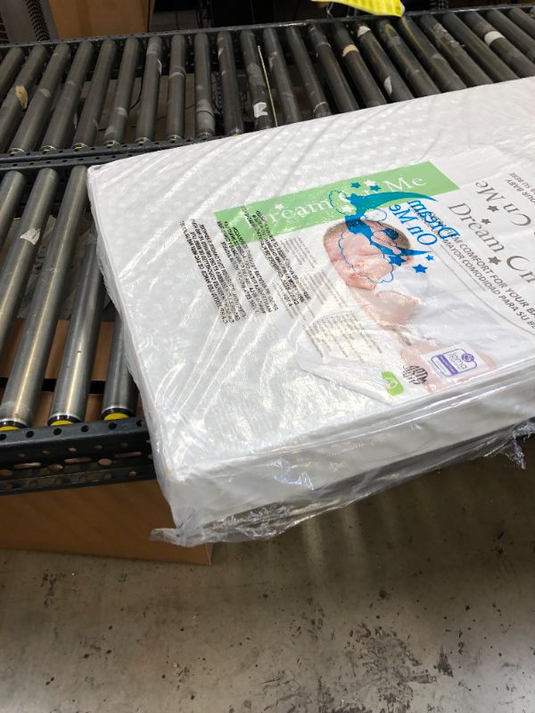 Photo 1 of Dream On Me, Orthopedic Firm Foam Standard Crib Mattress, White, Full (5E5WL)-------***HAS A RIP ON THE TOP SIDE OF BED----***

