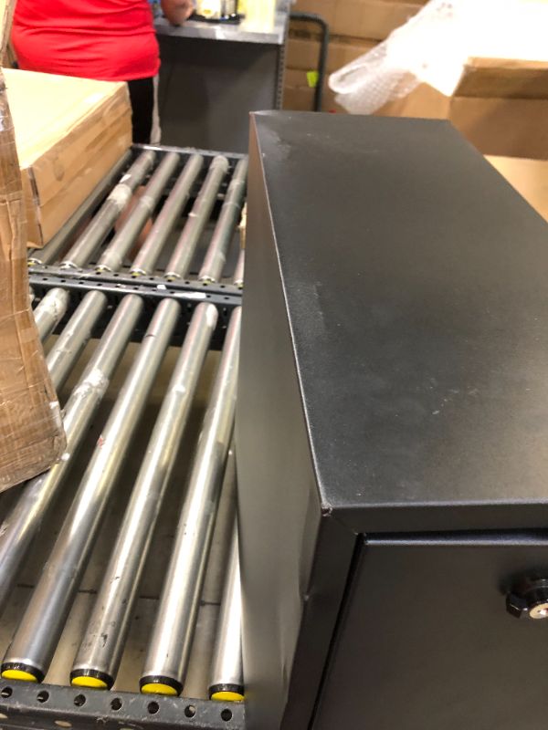 Photo 7 of Dee Zee DZ95D Steel Wheel Well Tool Box w/ Drawers black ------------there are minor dents at the bottom corners and some on the body --------
