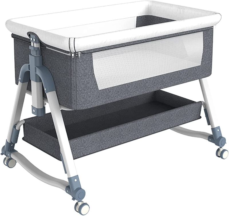 Photo 1 of Zdolmy Baby Bedside Bassinet Sleeper, Portable Crib for Baby with Storage Basket and Wheels, Adjustable Height Easy Folding Bed Side Co Sleeper, Grey-------possibly missing hardware and parts -------------sale for parts only -------------
