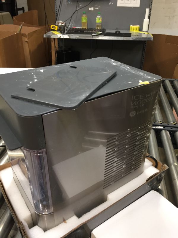 Photo 5 of GE Profile Opal 2.0 | Countertop Nugget Ice Maker | Ice Machine with WiFi Connectivity | Smart Home Kitchen Essentials | Stainless Steel----------used and box is damaged from moisture -----------
