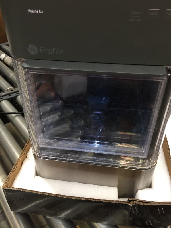 Photo 2 of GE Profile Opal 2.0 | Countertop Nugget Ice Maker | Ice Machine with WiFi Connectivity | Smart Home Kitchen Essentials | Stainless Steel----------used and box is damaged from moisture -----------
