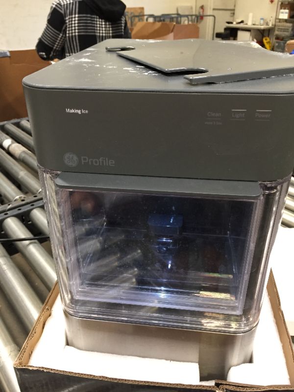 Photo 7 of GE Profile Opal 2.0 | Countertop Nugget Ice Maker | Ice Machine with WiFi Connectivity | Smart Home Kitchen Essentials | Stainless Steel----------used and box is damaged from moisture -----------
