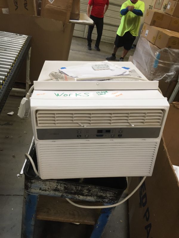 Photo 1 of air conditioning unit ----WORKS FINE BUT IS USED ----------AND COMES WITH THE REMOTE CONTROL