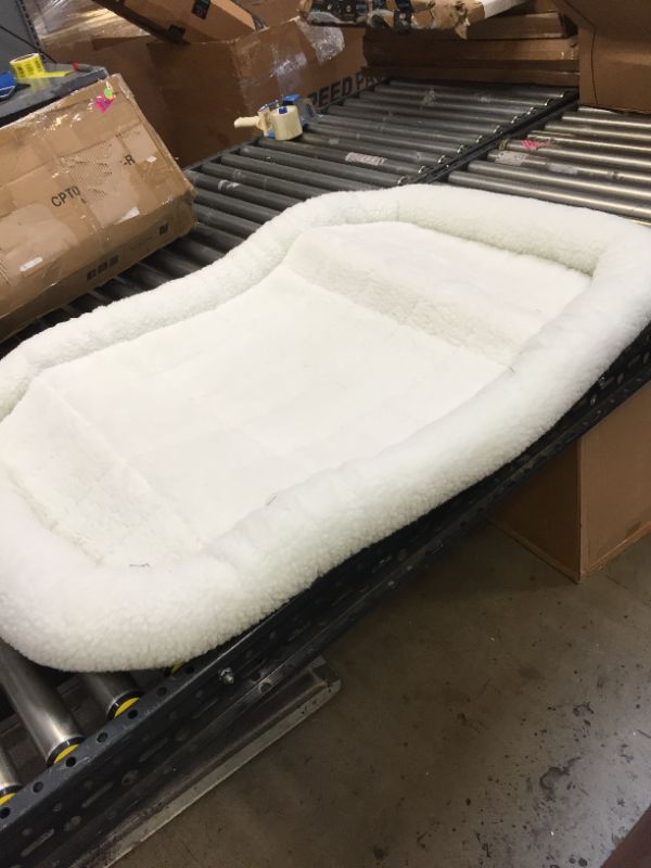 Photo 2 of 48L-Inch White Fleece Dog Bed or Cat Bed w/ Comfortable Bolster | Ideal for Extra Large Dog Breeds & Fits a 48-Inch Dog Crate | Easy Maintenance Machine...----------needs  a wash -------
