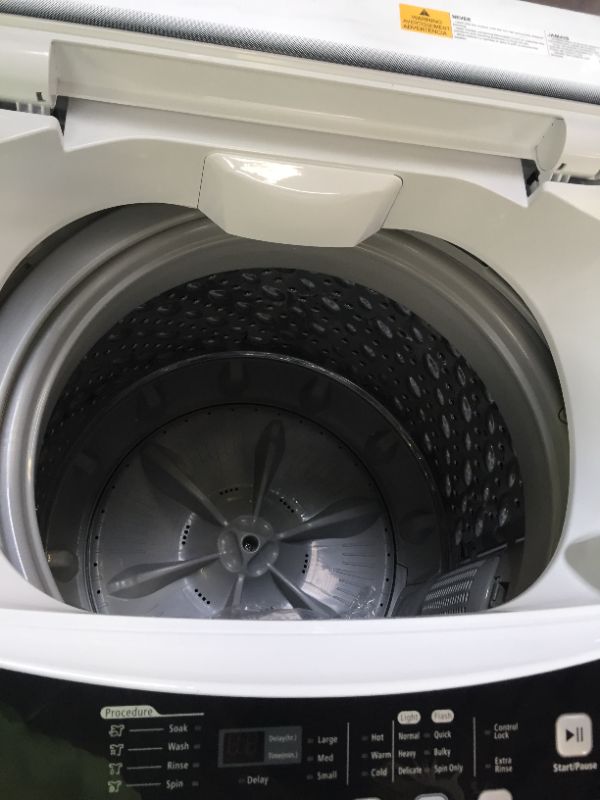 Photo 4 of BLACK+DECKER BPWM20W 2.0 cu.ft. Portable Washer, White--------IT DOES HAVE A MINOR SCRATCH FROM OPENING IT BUT OVER ALL IT IS NEW NEVER BEEN USED -------------
