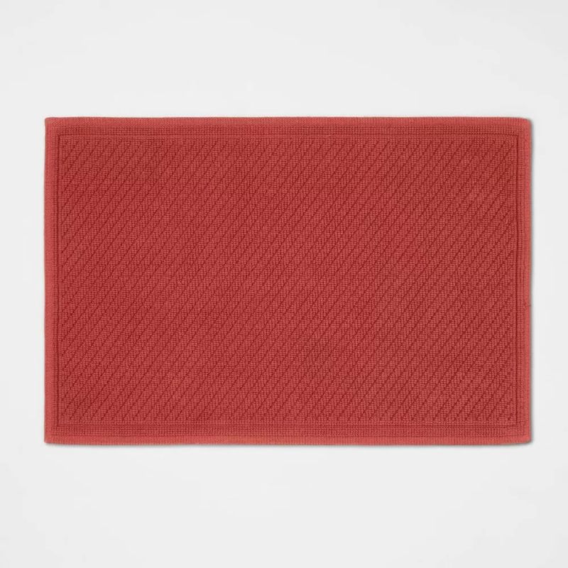 Photo 1 of 21"x30" Performance Solid Cotton Bath Mat Deep Red - Threshold
