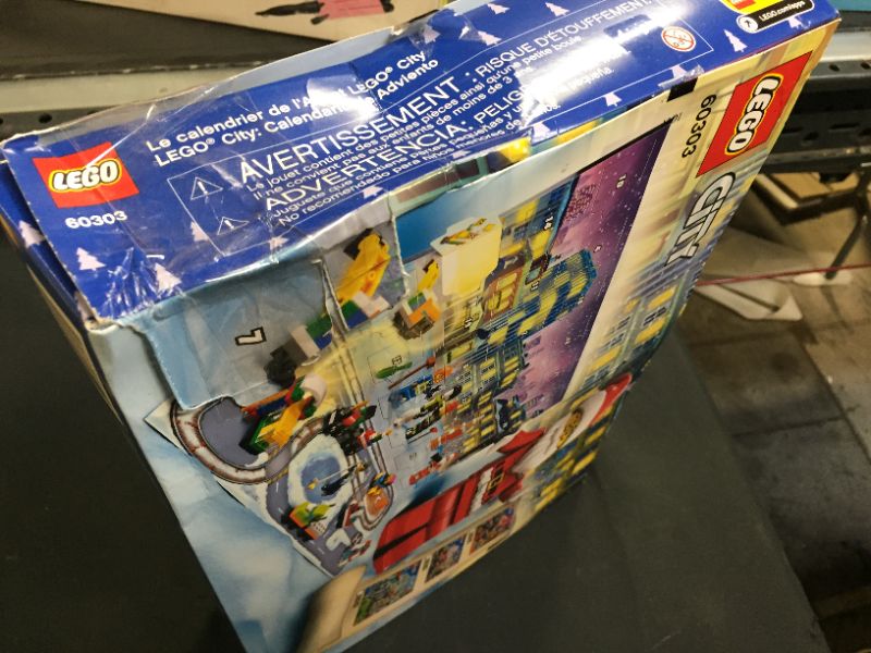 Photo 3 of LEGO City Advent Calendar 60303 Building Kit; Includes City Play Mat; Best Christmas Toys for Kids; New 2021 (349 Pieces) (DAMAGE TO BOX)
