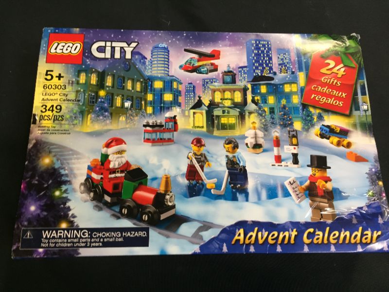 Photo 2 of LEGO City Advent Calendar 60303 Building Kit; Includes City Play Mat; Best Christmas Toys for Kids; New 2021 (349 Pieces) (DAMAGE TO BOX)
