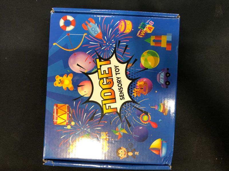 Photo 1 of box of fidget an sensory toys 