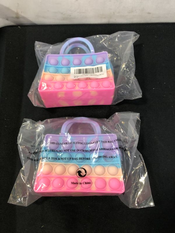 Photo 1 of Genovega Pop Pops it Mini Handbag Toys for Girls Kids Christmas Unique Gift, Soft Bags Push Popper Bubble Popping Poopers Sensory Toy Small Coin Purse Macaron Pouch Wallet (2 pack)