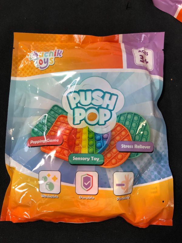 Photo 1 of Chuchik Push Pop Bubble Fidget Sensory Toy with Improved Clicking Sound–Fidget Poppers, Bubble Popping Sensory Toy – Premium BPA Free Silicone Poppet Fidget Toy Rainbow Unicorn & Dinosaur 2 Pack
