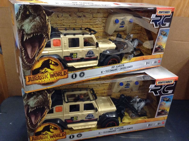 Photo 1 of 2 pack --?Matchbox Jurassic World Dominion Jeep Gladiator R/C Vehicle with 6-inch Dracorex Dinosaur Figure, Remote-Control Car with Removable Auto-Capture Claw------new factory sealed 
