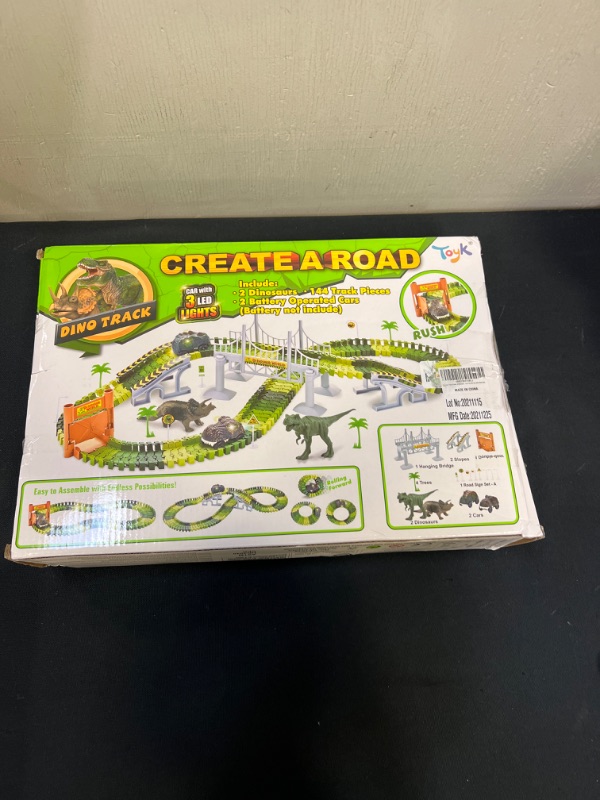 Photo 2 of Dinosaur Toys,Create A Dinosaur World Road Race,Flexible Track Playset and 2 pcs Cool Dinosaur car