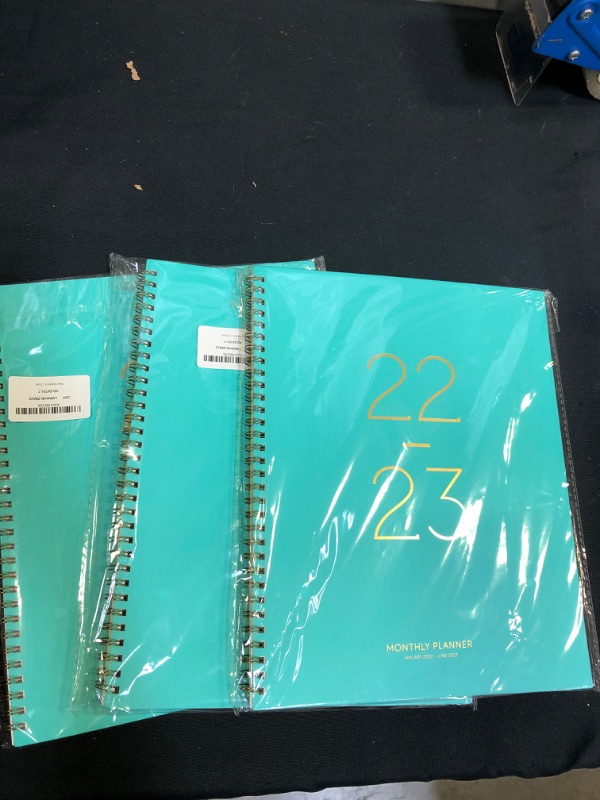 Photo 1 of 3 pack of monthly planners January 2022- June 2023 