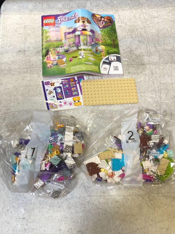 Photo 2 of LEGO Friends Doggy Day Care 41691 Building Kit (221 Pieces)---BOX HAS SOME DAMAGE FROM EXPOSURE---
